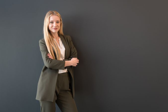 female posing in business suit