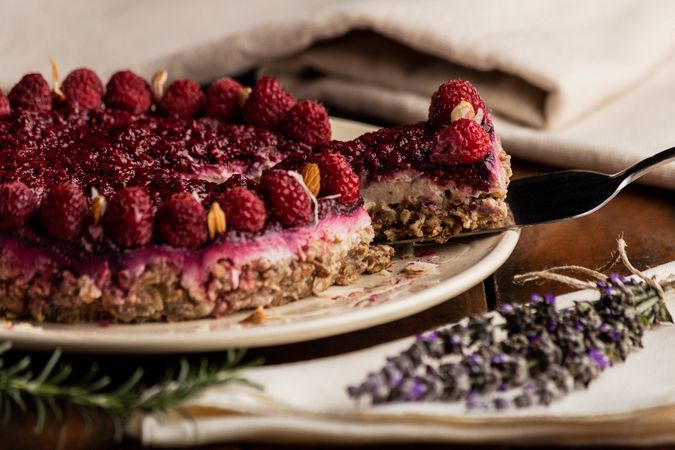 Fruit berry pie and branch of lavender on table