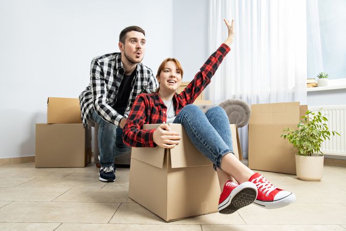 Concept of move with a happy young couple