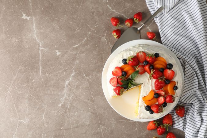 Composition with delicious berry cream cake. Tasty dessert
