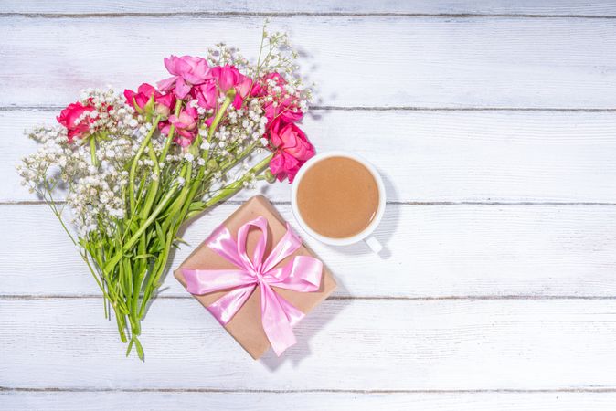 Background with flowers bouquet and gift