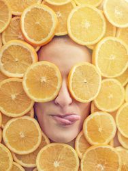 Woman in slices of orange