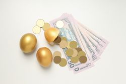 Concept of wealth and retirement - golden eggs