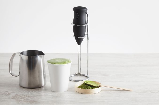 Ingredients and equipment to make matcha latte