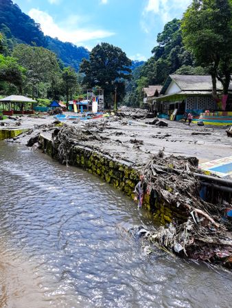 Tanah Datar, Indonesia - May 12, 2024: condition of the Mega Mendung water park which was affected by cold lava flash floods, natural disasters in Lembah Anai, Sepuluh Koto District, Tanah Datar Regency, West Sumatra, Indonesia