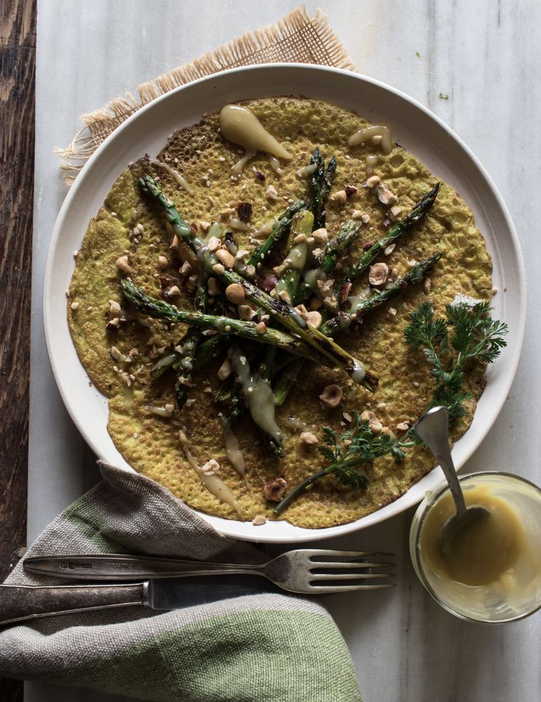 Served vegetarian crepe with oats and asparagus