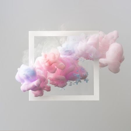 Cloud-like pastel pink and blue color paint with light frame on light  background