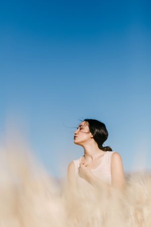 Woman standing in field