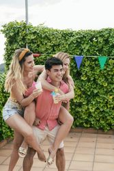 Group of friends having a pool party