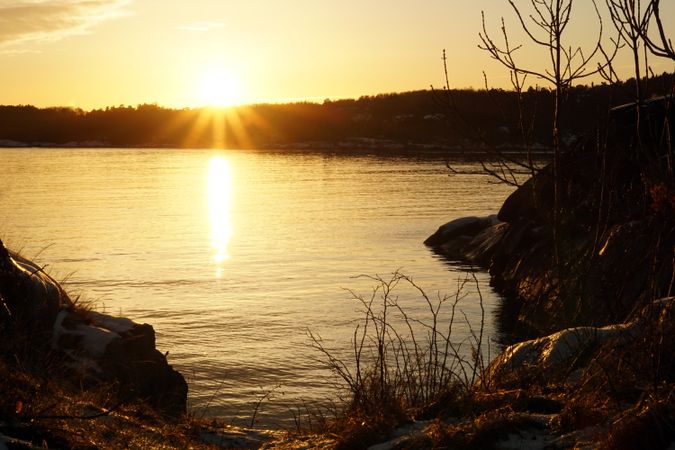 Peaceful seashore lake at sunset