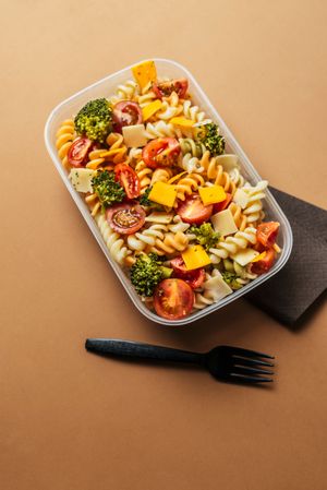 Lunchbox with pasta and plastic fork