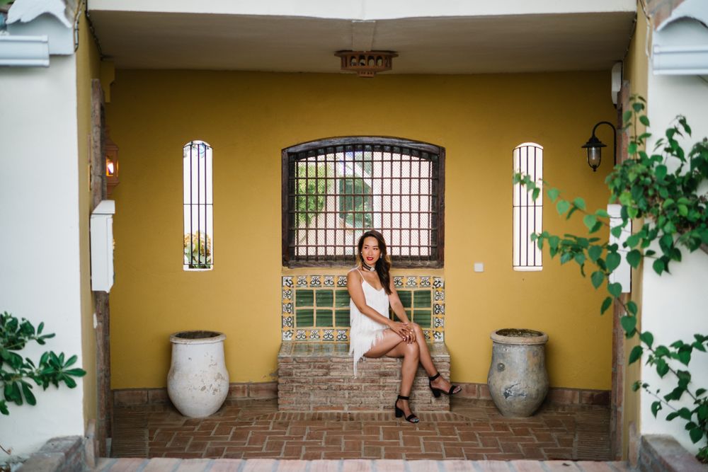 Young elegant Asian woman at a luxurious resort