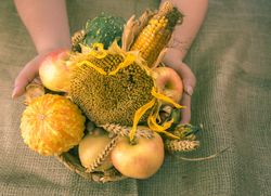Autumn products in a round wicker basket