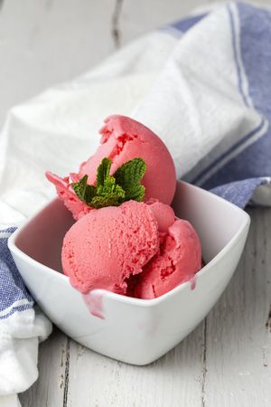 Appetizing strawberry ice cream in bowl