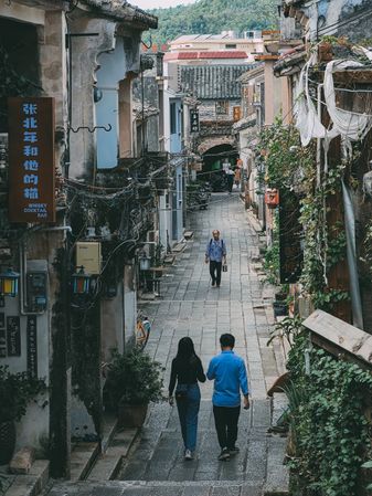 Top view of people walking in an alley in Dapeng, Shenzhen, China