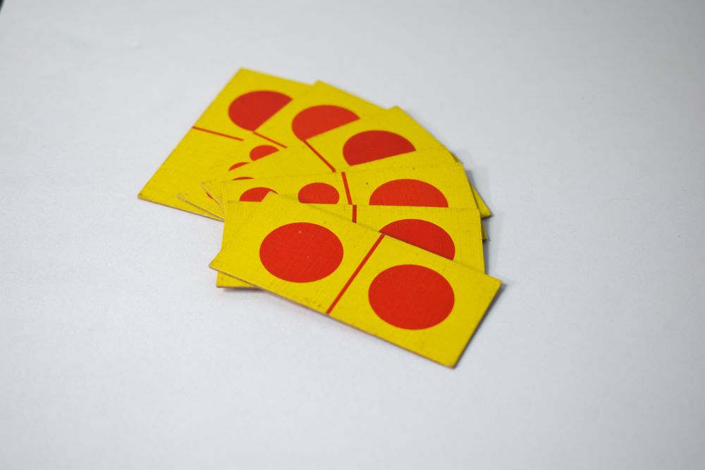 Domino cards resting on table
