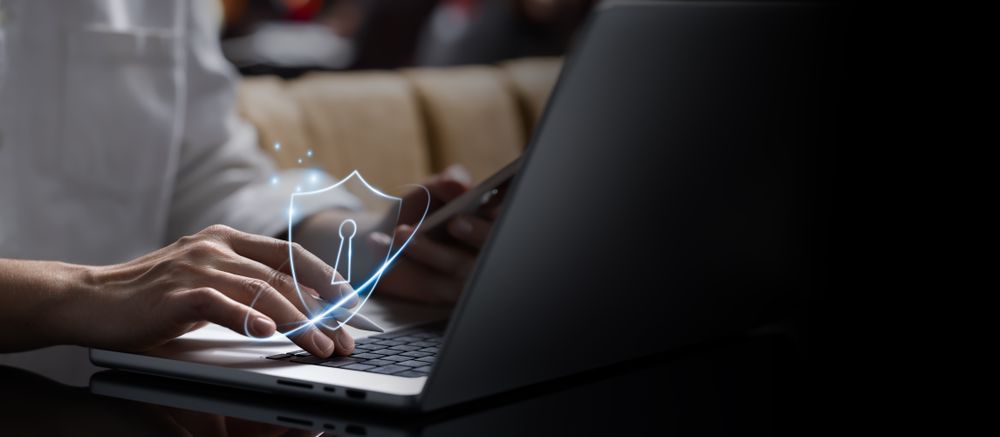 Businessman with holographic cyber shield