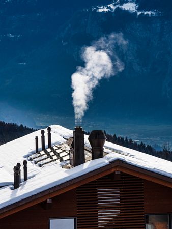 Swiss Alps winter landscape with snow and sun, mountains in Europe