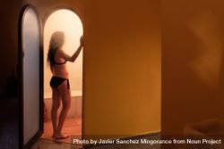 Woman in door of steam room in Arabic spa 5rXVdb