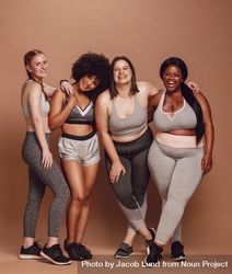 Healthy group of females wearing leggings, shorts and sport bras 0V8Br4