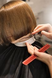 Child Modeling a Bob Haircut