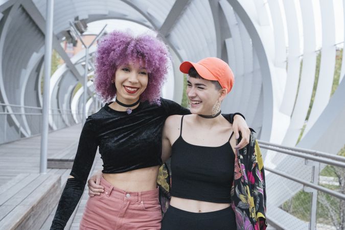 Woman walking together and laughing