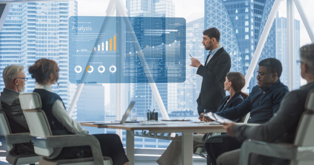 Office Conference Room Meeting Presentation: CEO Talks, Uses TV to Show Company Growth