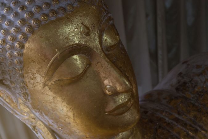 head of gold buddha image in Wat Non Kum, Nakhonratchasima Province, Thailand, public domain