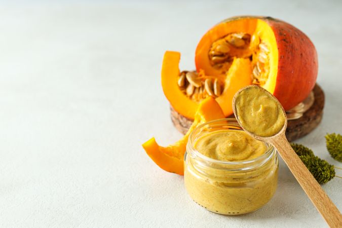 Skin care and face care concept - pumpkin cosmetic