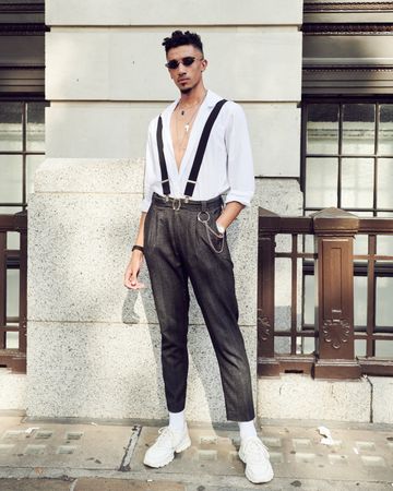 London, England, United Kingdom - September 15th, 2019: Modern dapper styled man posing outside