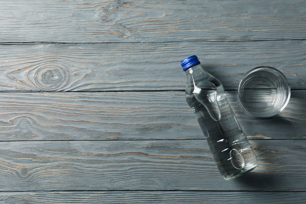 Top view of glass of water on table