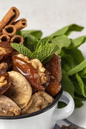 Dates fruits with walnuts, mint and cinnamon for Ramadan