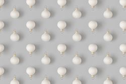 Holiday pattern with snowballs on gray background