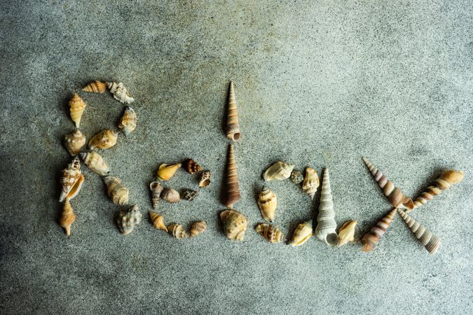 "Relax" spelled with sea shells