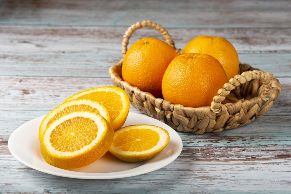 Sliced oranges on the table.