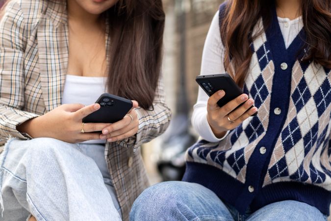 Young asian women using smartphone in the city