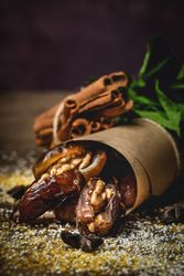 Dates fruits with walnuts, mint and cinnamon for Ramadan