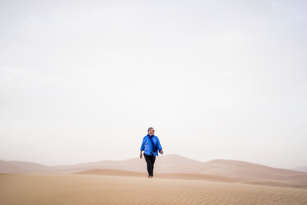 Mature man walking in desert