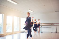 Smiling women in ballet class