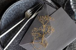 Place setting with delicate dried flower