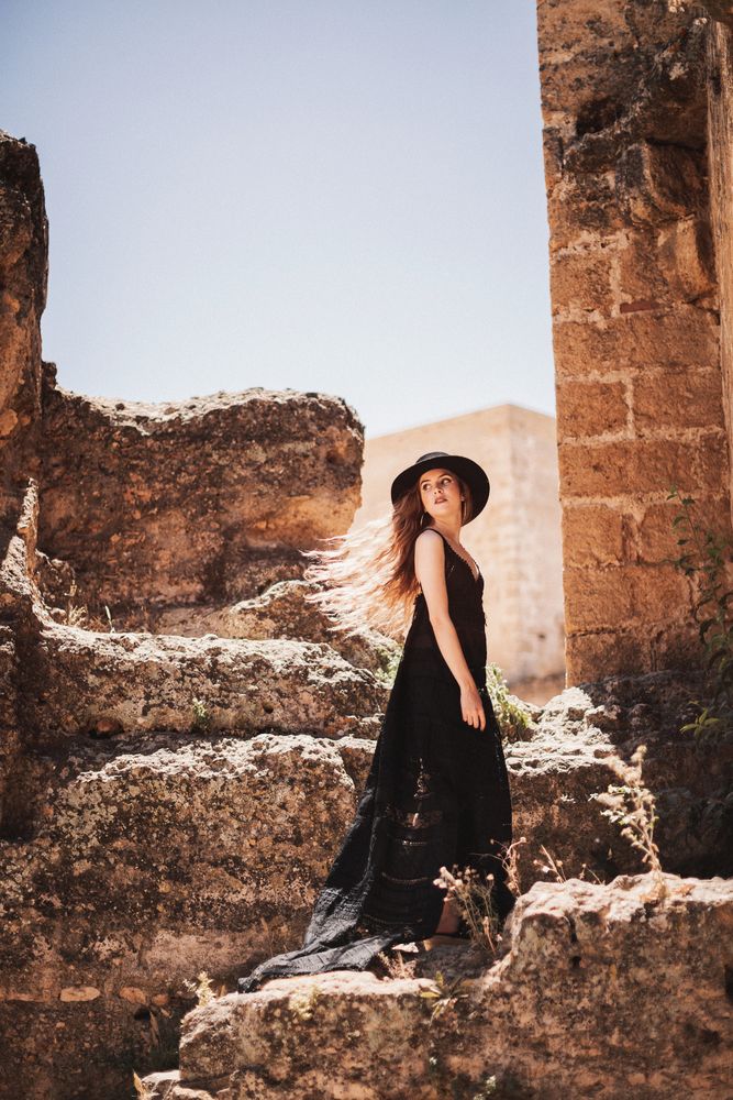 female in ruins of old castle
