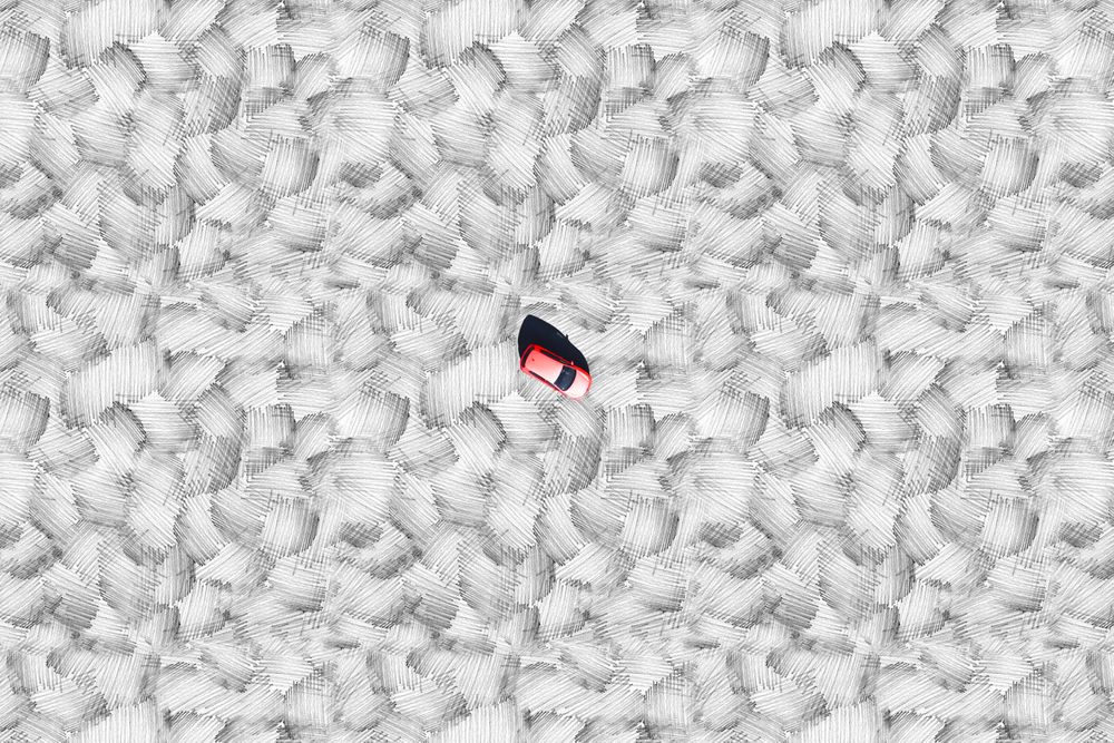Single red car on abstract grey background