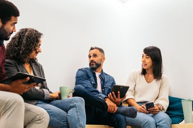 Group of multiracial people working with laptop in a coworking