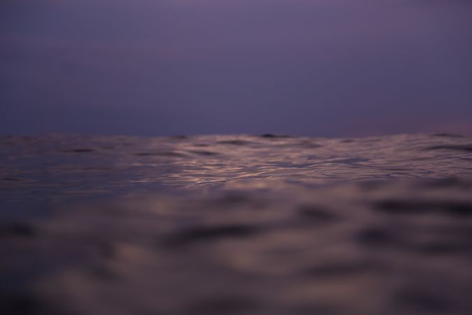 Water wave and cloudy sky