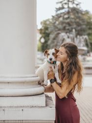 Woman holding dog