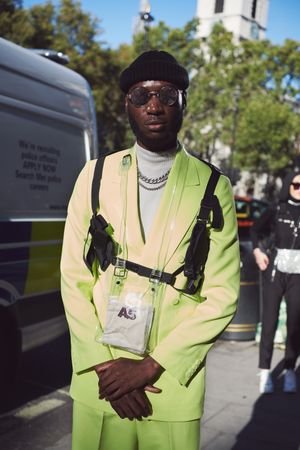 London, England, United Kingdom - September 15th, 2019: Portrait of young man dressed in green