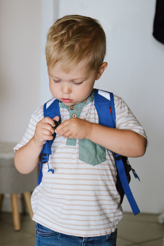 Cute little boy with backpack
