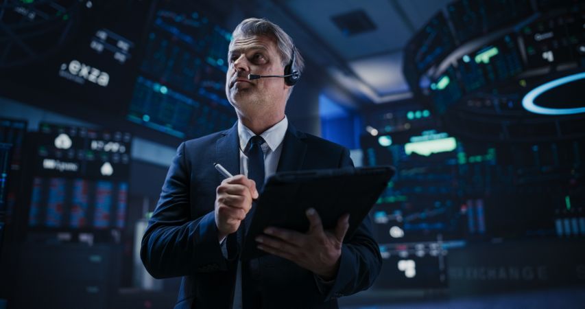 Businessman Analyzing Financial and Corporate Data
