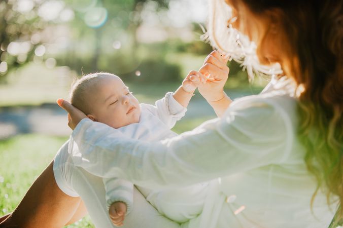 portrait of a baby with down syndrome with his grandmother