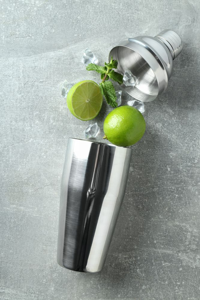 Concept of preparing cocktail, shaker, top view